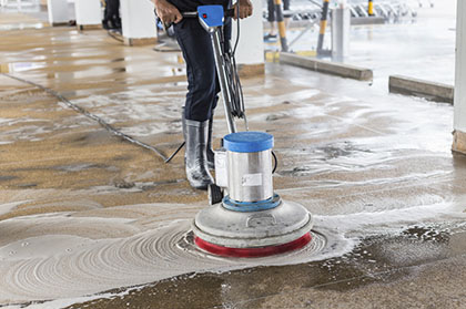 Deep cleaning - professional cleaner used auto floor scrubber