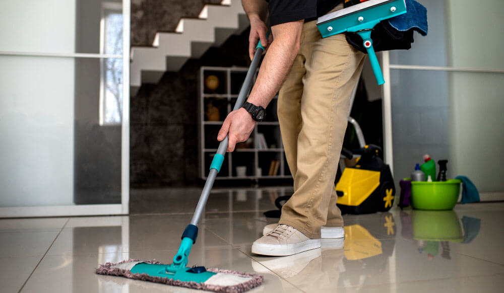 man doing professional home cleaning service